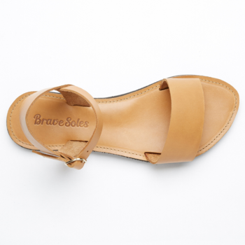 The Miina Natural Aventura Sandal: Ethically made natural leather walking sandal with arch support and secure ankle straps, ideal for any adventure.