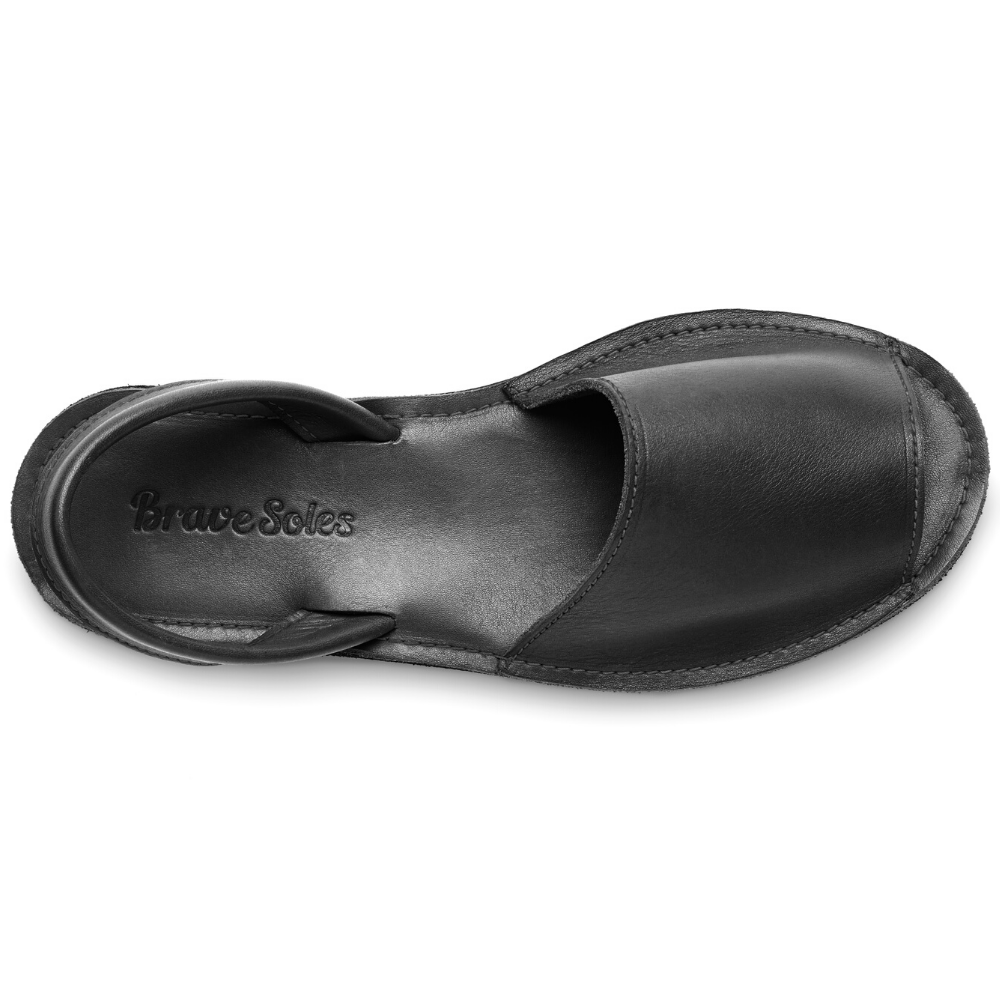 Black Avarca Sandal: Timeless black leather Avarca sandal with secure ankle strap and cushioned sole, perfect for any outing.