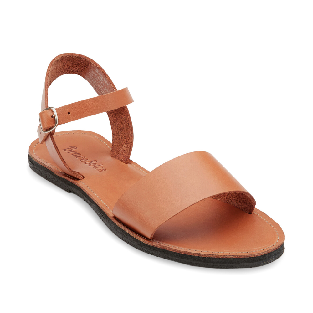 The Miina Caramel Aventura Sandal: Sustainable caramel leather walking sandal with arch support and secure ankle straps, perfect for travel.