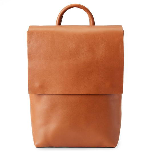 The Miina Leather Backpack in caramel, a leather bag with a minimal