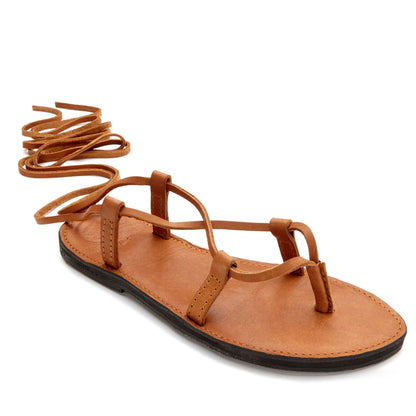 The miina Caramel Cleopatra Gladiator Sandal: Stylish caramel leather gladiator sandal with cushioned sole, offering versatile style and all-day comfort.