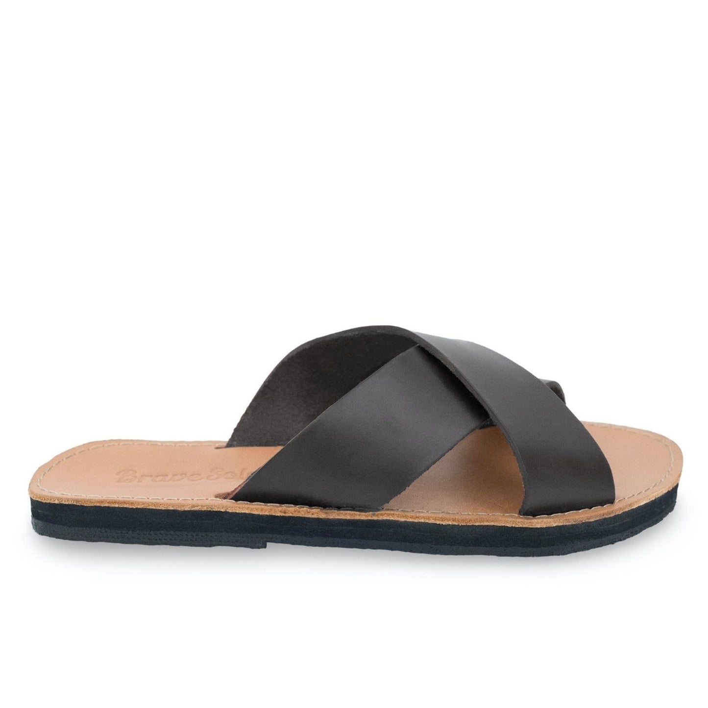 The Miina Constanza upcycled leather slide in black and natural.