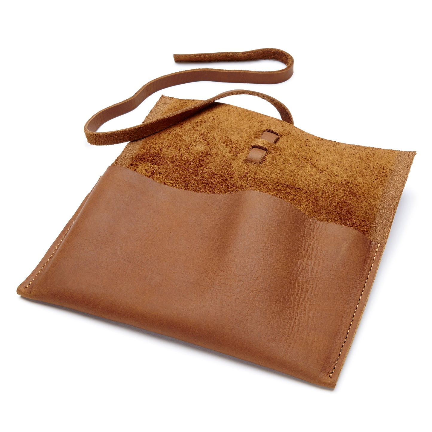 The Miina Sandra Caramel Leather Pouch laying flat and open, displaying its spacious interior and simple yet functional design.