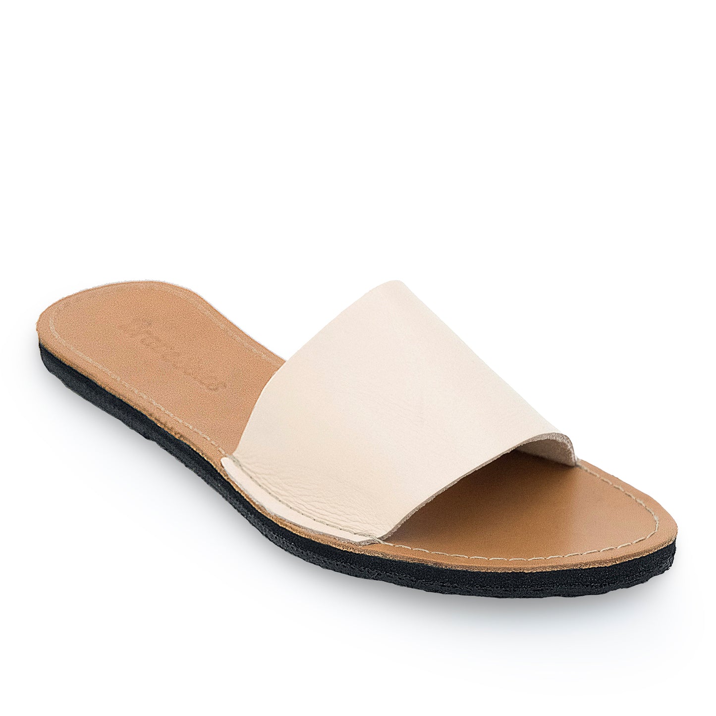 The miina Natural Linda Slide: Elegant natural leather slide with cushioned sole, perfect for dressing up any outfit with effortless style.