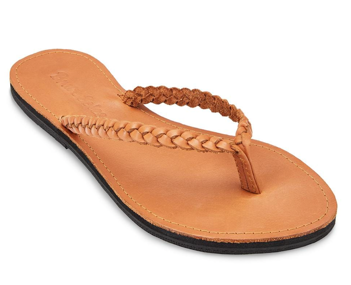 The Miina Caramel Trenza Sandal: Lightweight caramel leather braided sandal with cushioned sole, effortlessly combining style and comfort.