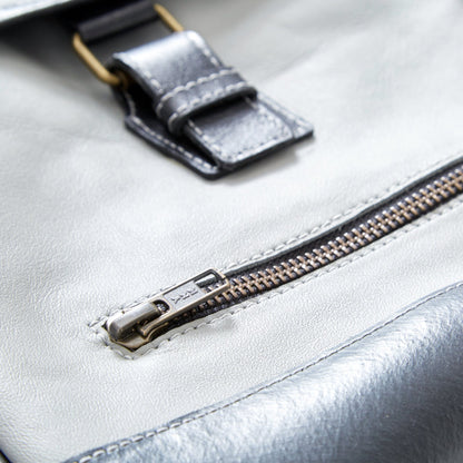 Closer view of The Miina Hudson messenger bag made with grey upcycled aircraft leather