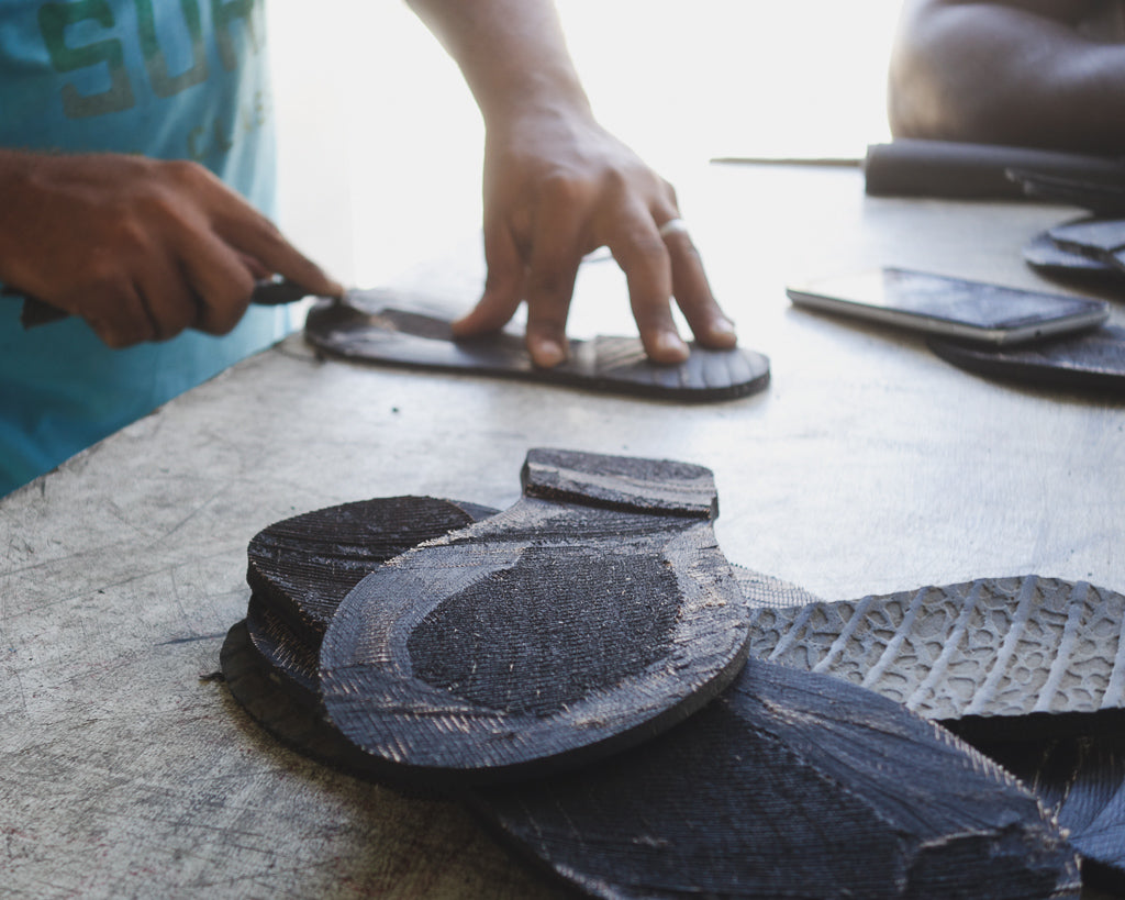 Brave Soles being handcut by team member