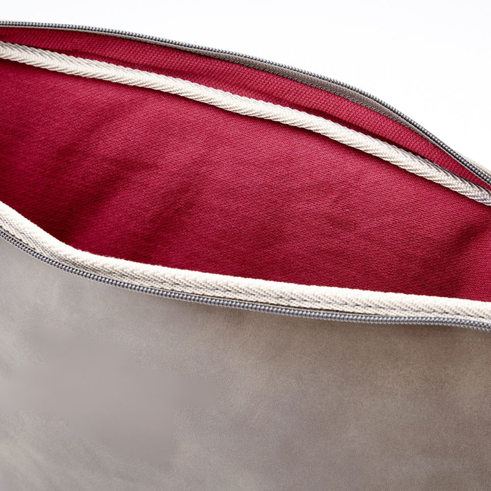 Simpatico eco conscious leather travel laptop case open to show fabric lining
